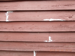 安曇野市の住宅/外壁木板塗装　割れ補修工事画像